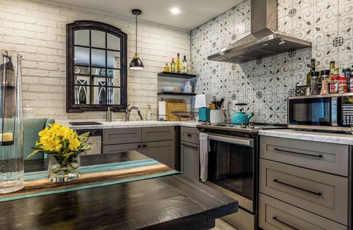 Historic District Cottage | PERFECT LOCATION, 2 bedroom two bath furnished unit. Where history meets charm.