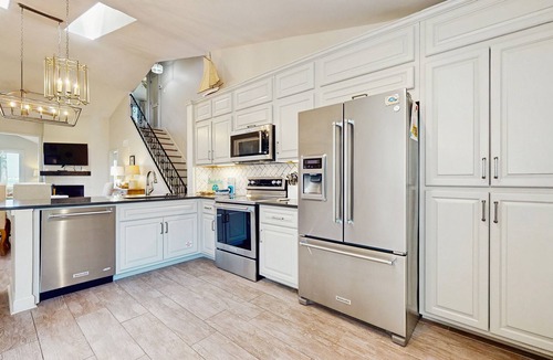 Sandestin Condo | Perfectly located home with golf cart, open layout, smart TVs, W/D, & pools