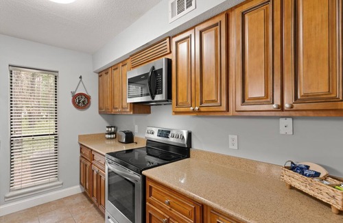 Saint Simons Heights Condo | Pet Friendly, Ground Floor Condo w/Pool, Fitness Center, Pickleball & 2 Bikes