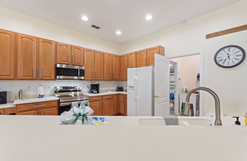 Highlands Reserve Villa | Pristine sunset villa with golf course views. and 15 minutes from Disney.