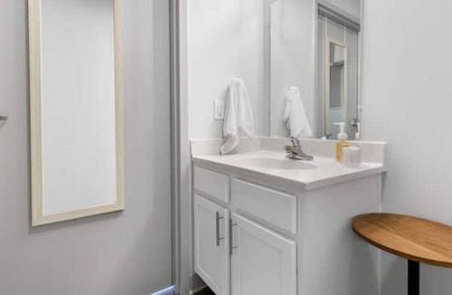 Central City Apartment | Private loft with rooftop deck, fitness center, and private parking.
