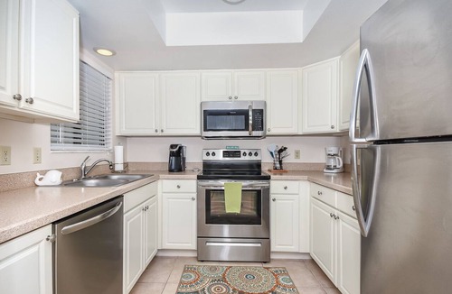 New Smyrna Beach Condo | Quaint 2 bedroom 2 bath villa Walking distance to the car free beach. S4358