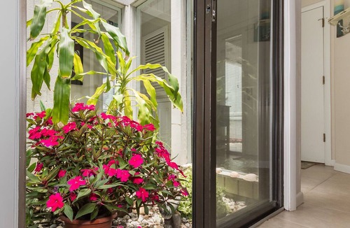 New Smyrna Beach Condo | Quaint 2 bedroom 2 bath villa Walking distance to the car free beach. S4358