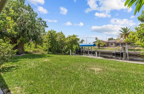 Punta Gorda House | ☼ Quiet Neighborhood on a Canal with Boat Dock, Sea Wall and Lanai! And Kayaks