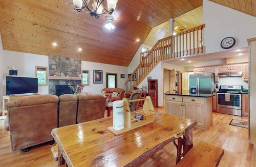 Murphy House | Relax by the river in Murphy: Spacious decks, stunning views, and endless advent