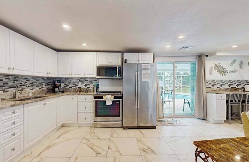 Port Charlotte House | Relax, Swim & Explore! A Dog-Friendly Private Pool Retreat Close to Everything!
