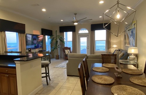 Bahama Beach Condo | Remodeled 3 BR 2BA condo steps to the beach! Sunset views and private garage.