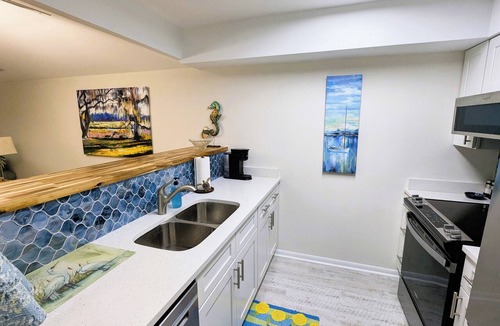 Saint Helena Island Condo | Resort access & golf cart. See reviews. On canal. Short walk to beach. <week-ask