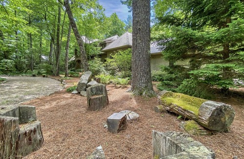 Highlands Cabin | Rustic Elegance. Three Fireplaces. A Crown Jewel of a Screened Porch | Sagee Woods