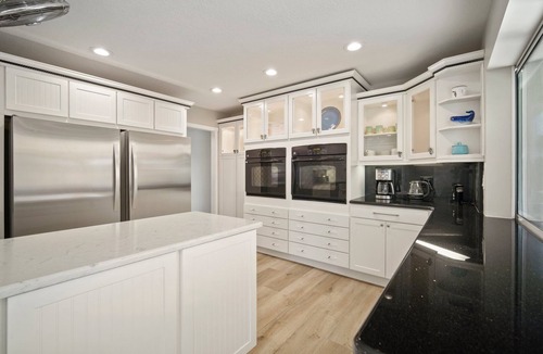 Bal Harbour House | Saltwater canal front 4 bedroom tropical home with private pool and boat dock