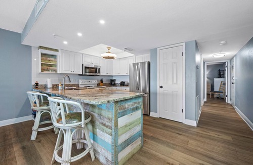 Madeira Beach Condo | 🌴Sandy Shores #204 - Across from John's Pass, Pool, Gulf front!🌴