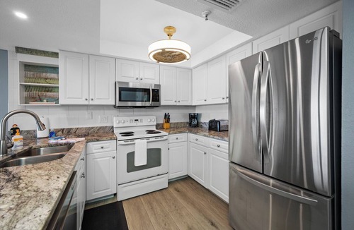 Madeira Beach Condo | 🌴Sandy Shores #204 - Across from John's Pass, Pool, Gulf front!🌴