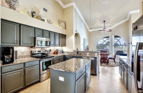 Pelican Villa | South Facing Luxury with Gulf Access, Pool & Dock