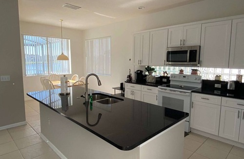 Sunset Lakes House | South Facing, prime lake front home, 10 minutes from Walt Disney World® Resort!