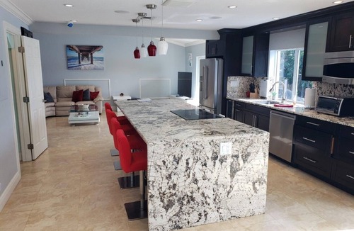 Survey Creek House | Spacious Modern Waterfront Lake Home with Heated Pool/15 min Drive to Beach!