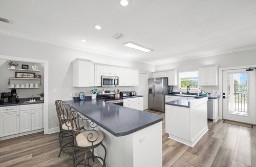 Ono Island House | Spacious Perdido Key Retreat: Sand Volleyball, Dock, Gameroom & Beach
