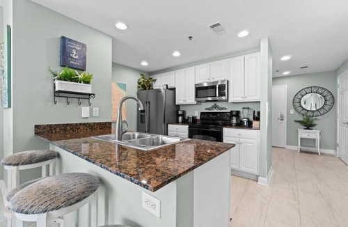 West Panama City Beach Condo | Splash 301E - 2 Gulf-Front Suites Water Playground + Beach Chairs & More!