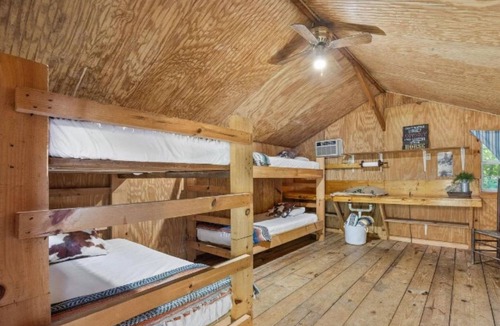 Revelo Resort | Step Into Your Own Western Town Cabins, Saloon, ATV Trails & Private Group Stays