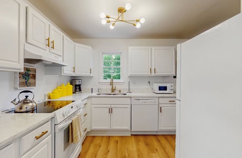 Beach Institute Hotel | Stylish southern stay with two full homes in one, quaint backyard, and walkable