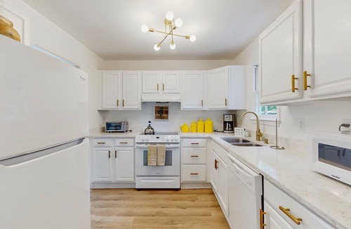 Beach Institute Hotel | Stylish southern stay with two full homes in one, quaint backyard, and walkable
