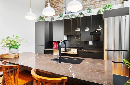 Faubourg Lafayette Hotel | The Gisele: 4BR/4BA for 8 | Pool + Streetcar Stop