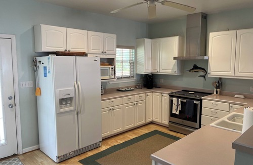 Perdido Beach House | "The Perfect Getaway" w/boat dock & water access in front & in back of house!