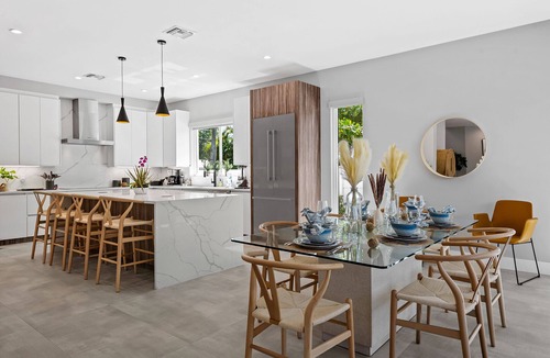 Middle River Terrace House | The Riverhouse – A Stunning Modern Heated Pool Retreat with Serene and Scenic Waterway Views!
