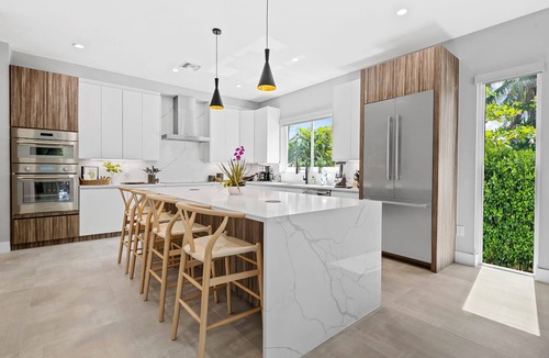 Middle River Terrace House | The Riverhouse – A Stunning Modern Heated Pool Retreat with Serene and Scenic Waterway Views!