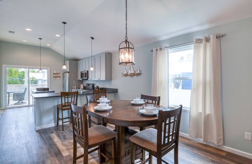 Butler Beach House | Tropical Winds - Heated Pool & Firepit! Walk to the Beach!
