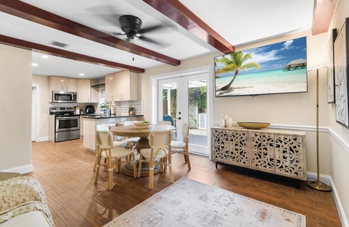 West Palm Beach House | Two-House Lakefront Retreat w/Heated Pool, 6 Person Hot Tub, Kayaks & Fire Pit