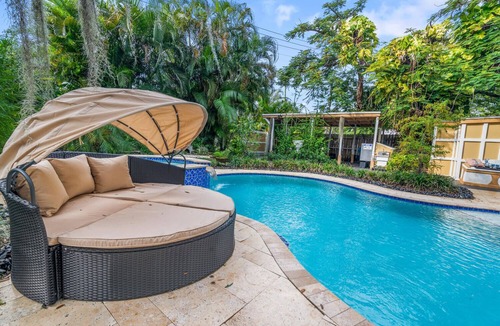 West Palm Beach House | Two-House Lakefront Retreat w/Heated Pool, 6 Person Hot Tub, Kayaks & Fire Pit
