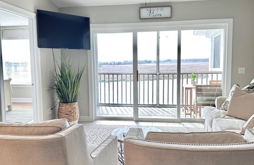 Darien Condo | Wake Up on the River! Walk to charming Downtown Darien. w/boat slip
