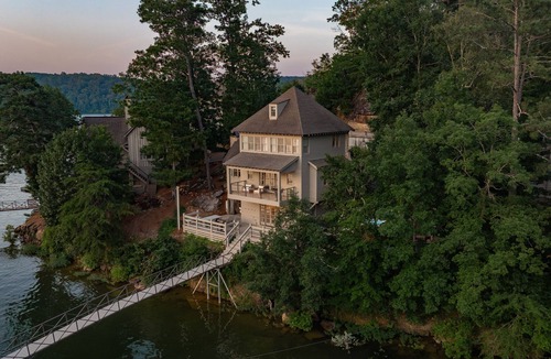 Crane Hill House | Water's edge, gated community, private dock with toys, community pool, hot tub