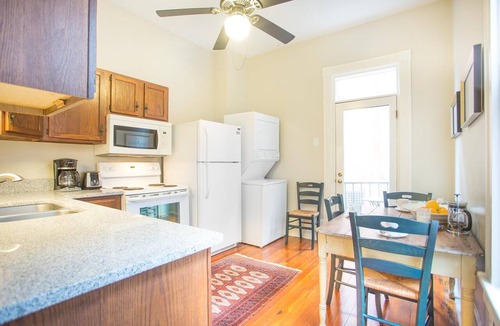 Savannah Victorian District Apartment | Well Appointed Row Home Overlooking Forsyth Park by Lucky Savannah