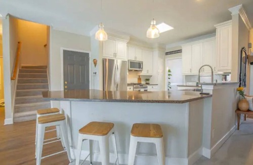 Five Forks House | Whimsical 4 bedroom house with a cozy backyard