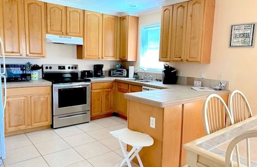 Cudjoe Key House | Yellow Home - Receive 400 dollars towards a BOAT RENTAL!