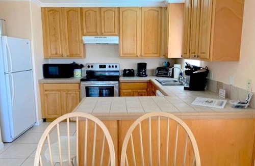 Cudjoe Key House | Yellow Home - Receive 400 dollars towards a BOAT RENTAL!