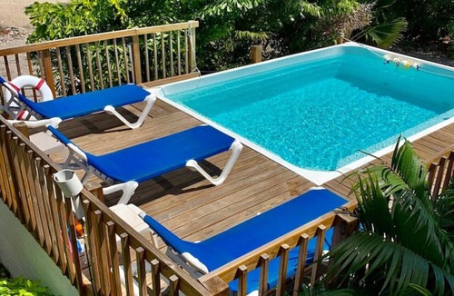 Cudjoe Key House | Yellow Home - Receive 400 dollars towards a BOAT RENTAL!