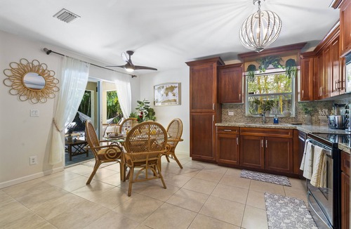 Southwest House | 🌴 Your Private Boho Oasis Awaits! Relax in a stylish 2BR retreat just 2 miles from Downtown West Palm Beach. Lounge by your saltwater pool, cozy up by the firepit, and enjoy a getaway that feels like a boutique vacation every day.