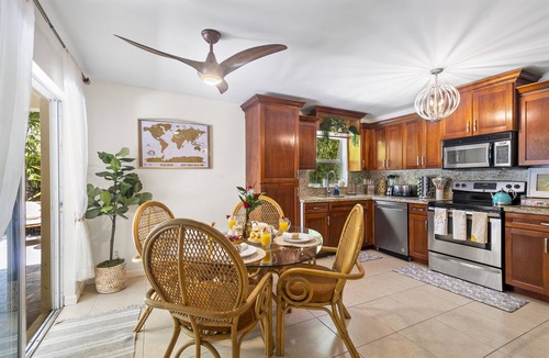 Southwest House | 🌴 Your Private Boho Oasis Awaits! Relax in a stylish 2BR retreat just 2 miles from Downtown West Palm Beach. Lounge by your saltwater pool, cozy up by the firepit, and enjoy a getaway that feels like a boutique vacation every day.