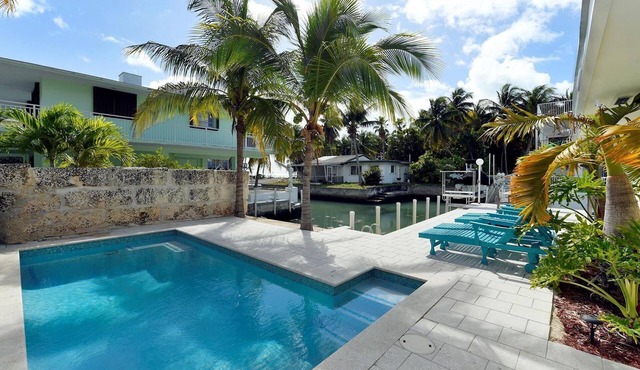 4BR waterfront home with POOL, boat slip with straight shot to Alligator Reef!