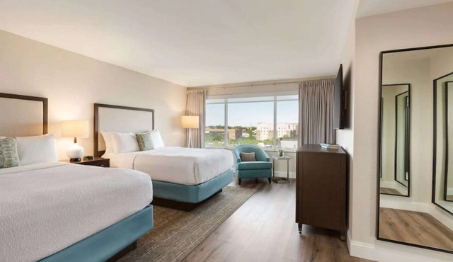 Along Wilmington Riverwalk + On-site Dining & Pool