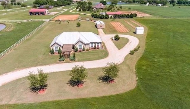 Beautiful 8.5 acres farm house with sunroom and basketball court