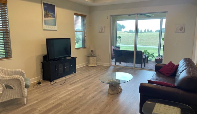 Beautiful golf course view. Large kitchen. Open concept living area.