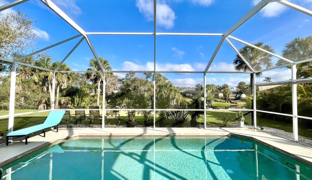 Charming 2BR waterfront retreat with serene views and heated pool