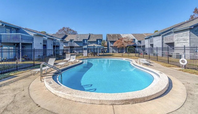 Coastal Charm Townhome! Spacious townhome with backdoor access to the pool!