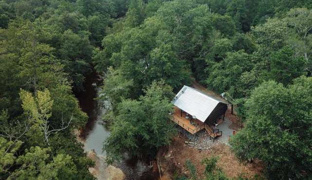 Creek-side getaway, big deck, easy access to the city while being off the grid!