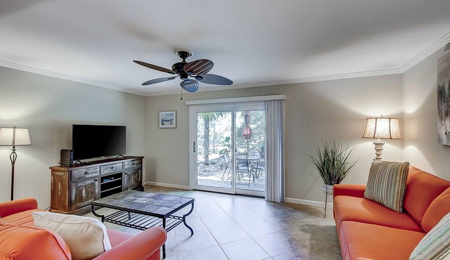Dog Friendly Condo with Fast WiFi, a Patio, & Shared Pool Walk to the Beach