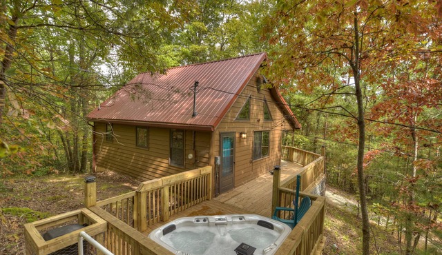 Fox Den Cabin is the perfect mountain cabin that sleeps 4 w/ hot tub & fire pit.
