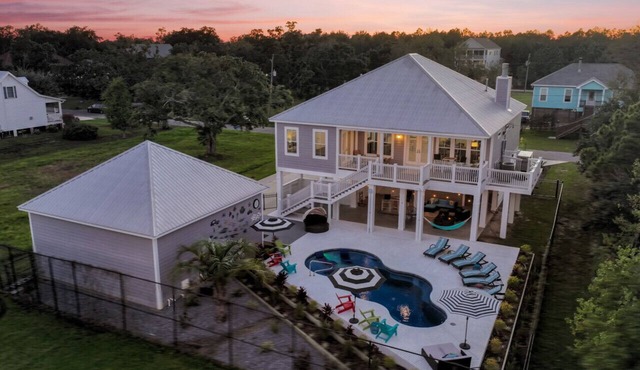 Heron Retreat | Luxury Beach House with Heated Pool